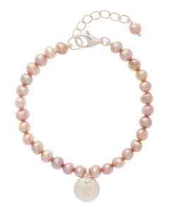 Bracelets made with pearls or similar rounded materials can be styled into a circular shape...